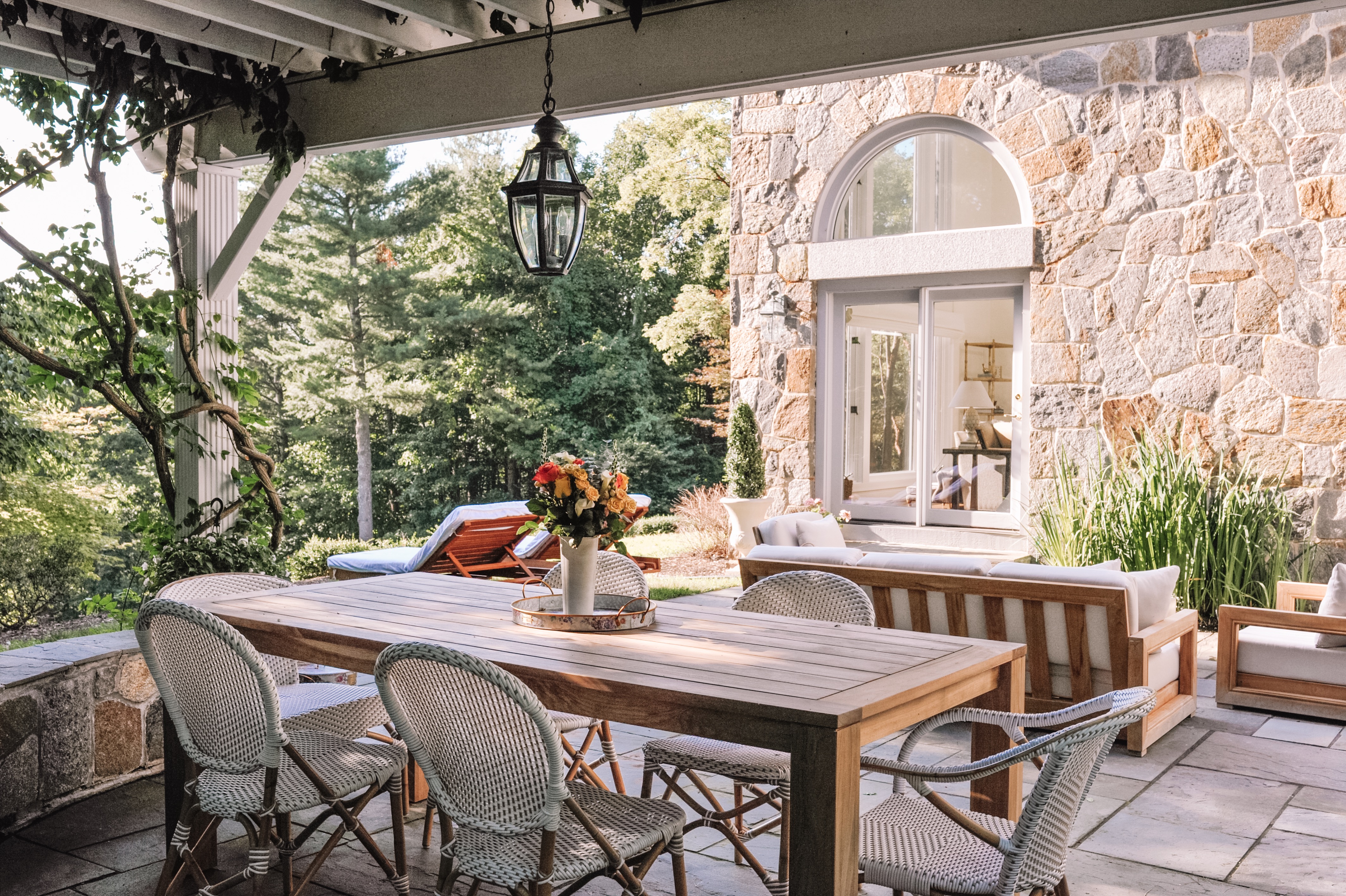 Outdoor Dining Table Under Pergola